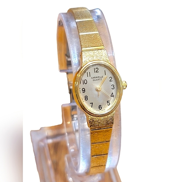 Bulova Accessories - Vintage Caravelle by Bulova Gold Tone Woman's Dainty Wrist Watch